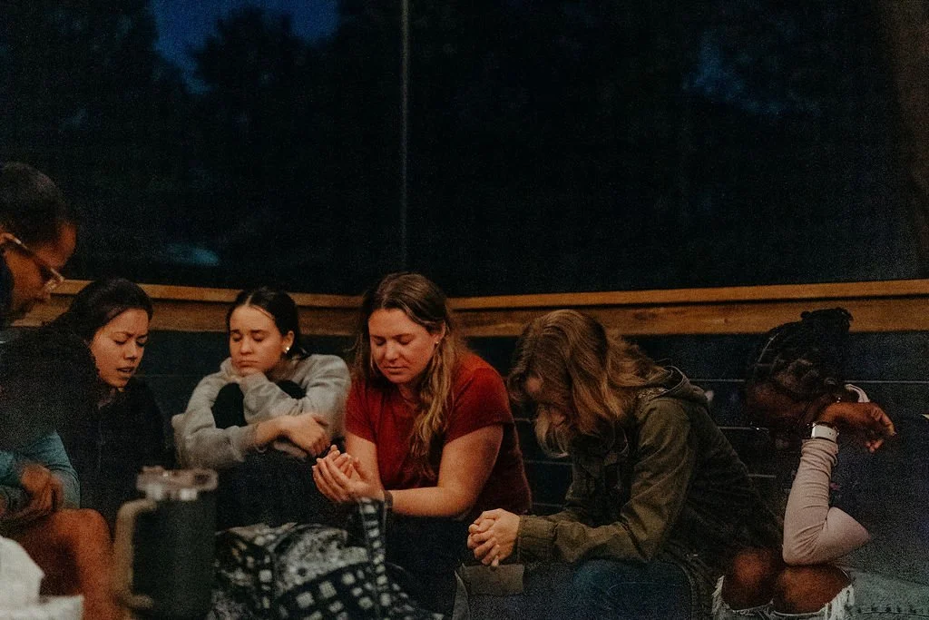 Our team praying together